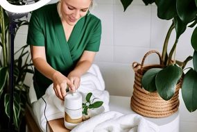 Woman receiving a relaxing idaho falls spa treatment with essential oils at Austin Kade Academy.